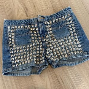 Custom studded jean shorts